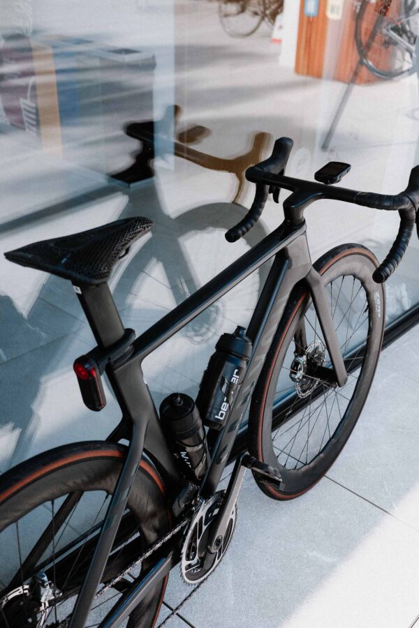 watts and grams mount with Garmin Varia rear light installed on Canyon Aeroad seatpost.