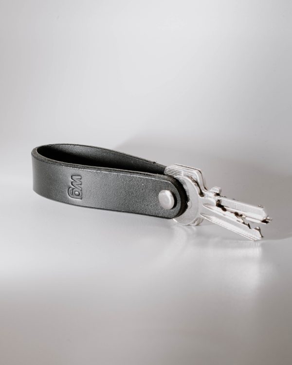 watts and grams key chain with embossed wg logo with two mounted keys.