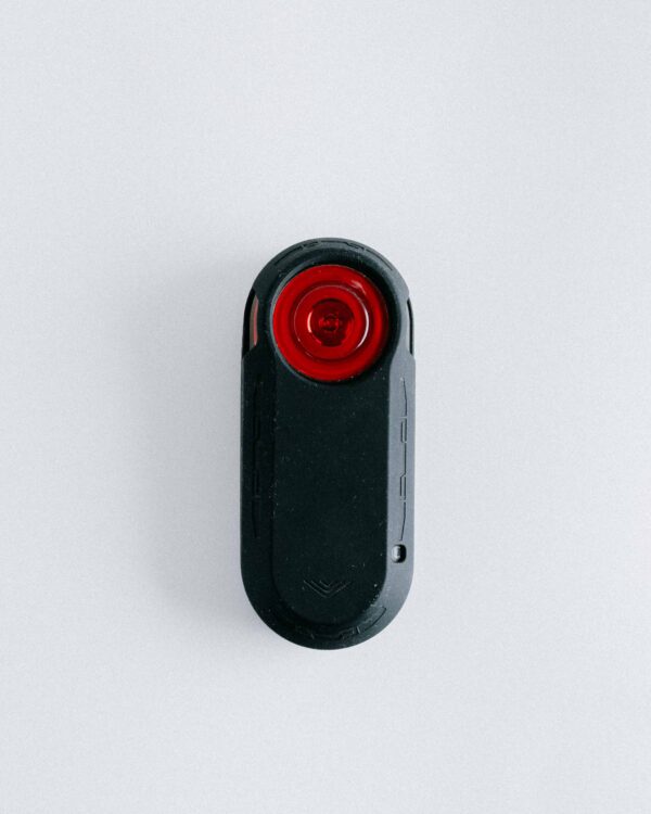 Garmin Varia rear light in a black silicone case, seen from the front.